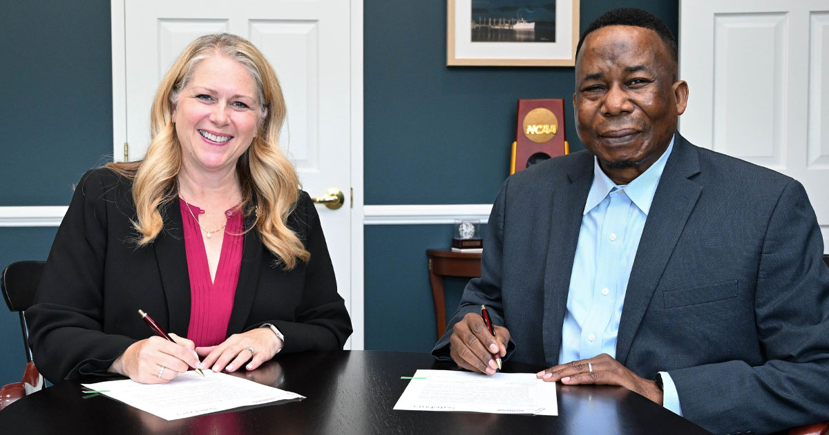 SU President Carolyn Ringer Lepre and Nubian American Advanced College President Joseph Isaac